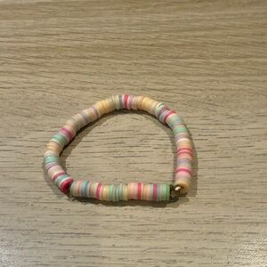 Cute clay bracelet perfect for anything!!! Star charm in middle!⭐️💕⭐️💕